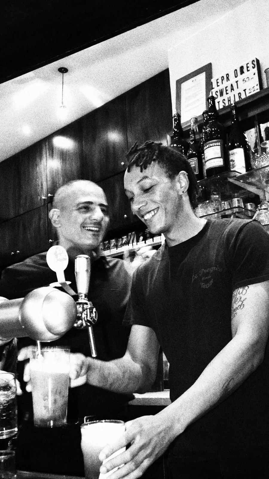 The bartenders at work