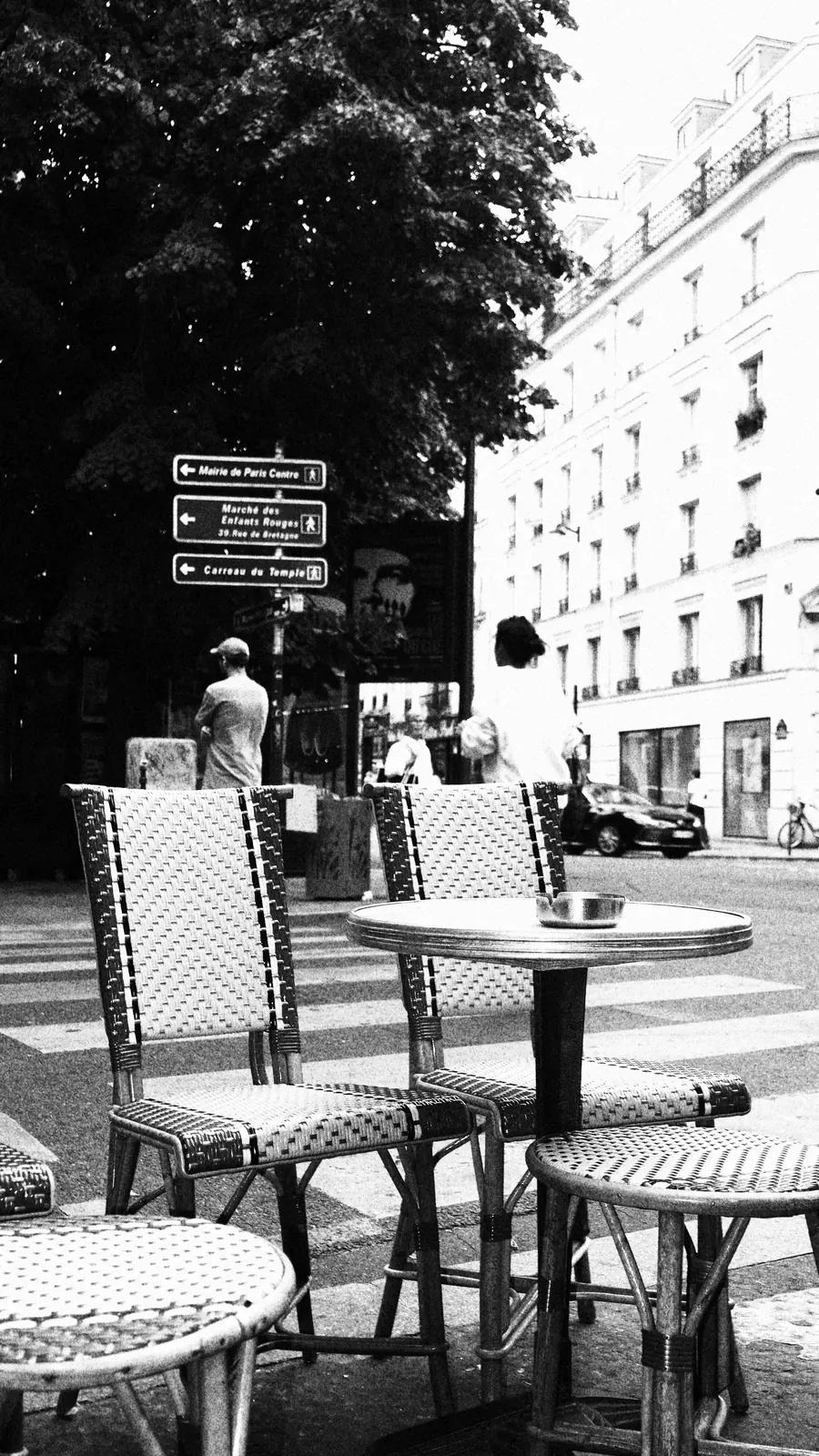 Rattan bistro chairs on rue de Bretagne